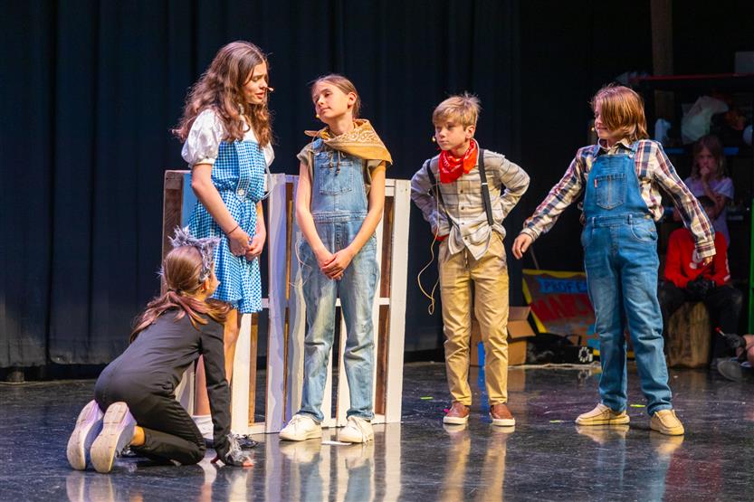 Students in a Wizard of Oz performance
